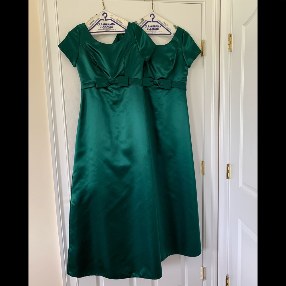 Two emerald green bridesmaid dresses